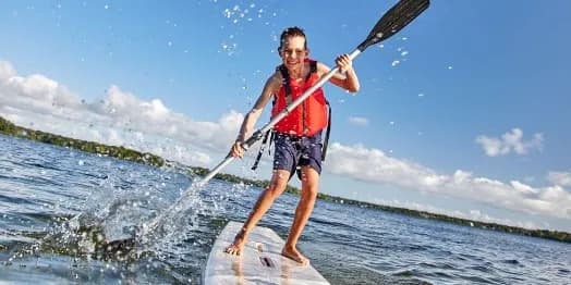 Exsportise - student na paddleboardu